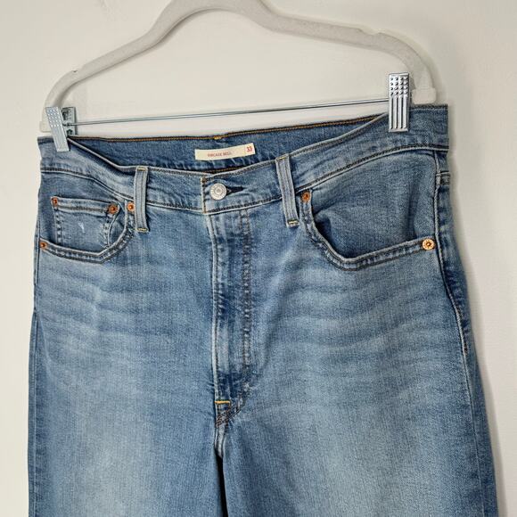 Levi's Ribcage Bell Jeans blown out knee Womens Size 33 - Picture 4 of 14